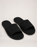 Men's black corduroy open-toe slippers, front three-quarter studio view