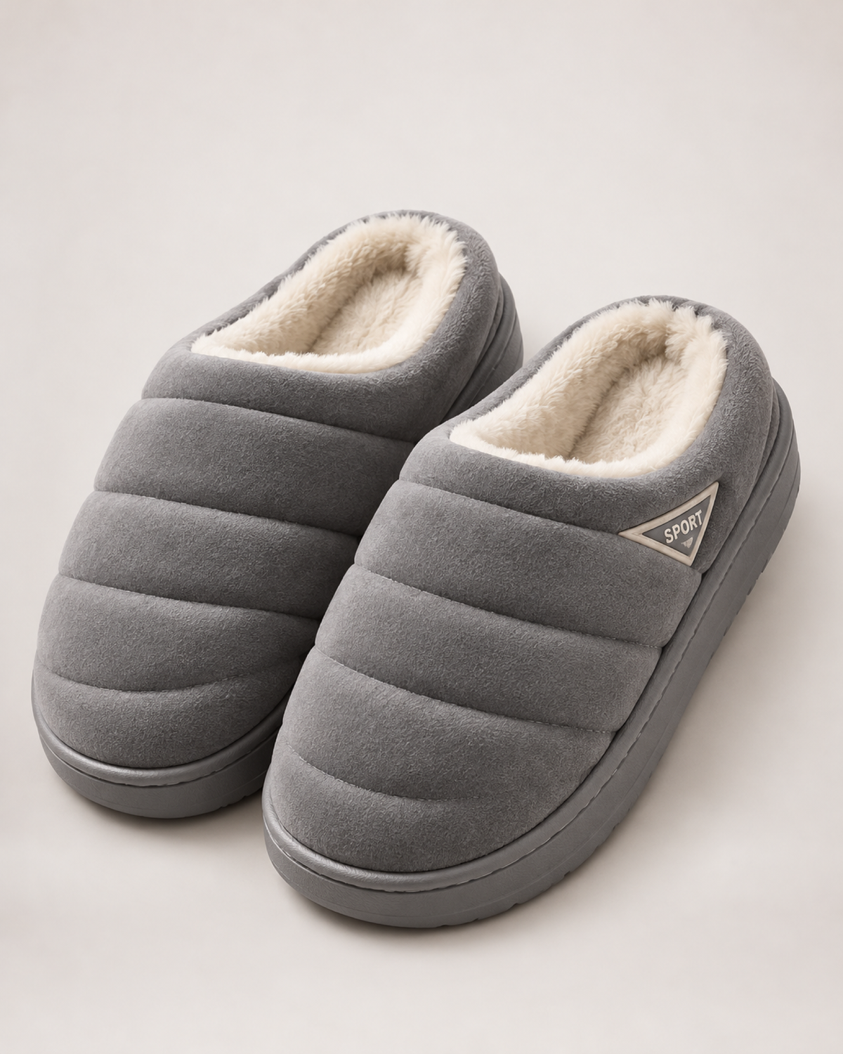 Men's grey quilted plush slippers, front three-quarter studio view