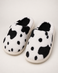 Women's Spotted Cow Slippers in Black, studio hero