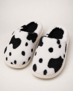 Women's Spotted Cow Slippers in Black, studio hero