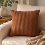 Coffee ribbed cushion cover styled on a sofa