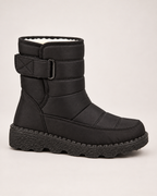 Women's Snow Boots - Plush-Lined Buckle Style, outer side view showing shaft and sole profile
