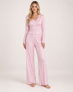 Women's pink V-neck button-front pyjama set, straight front studio view