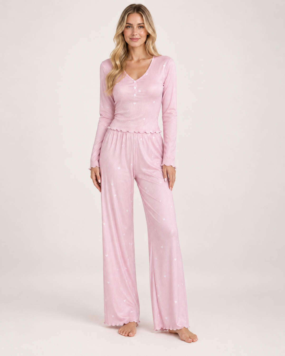 Women's pink V-neck button-front pyjama set, straight front studio view