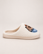 White embroidered capybara slipper shown in side profile