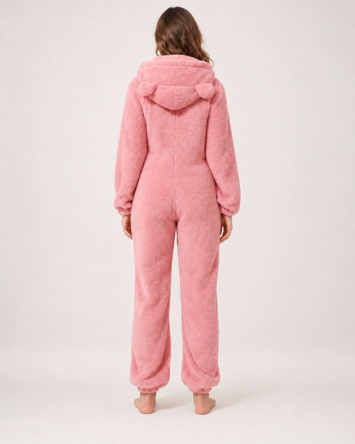 Women's pink bear-ear fleece onesie, rear studio view