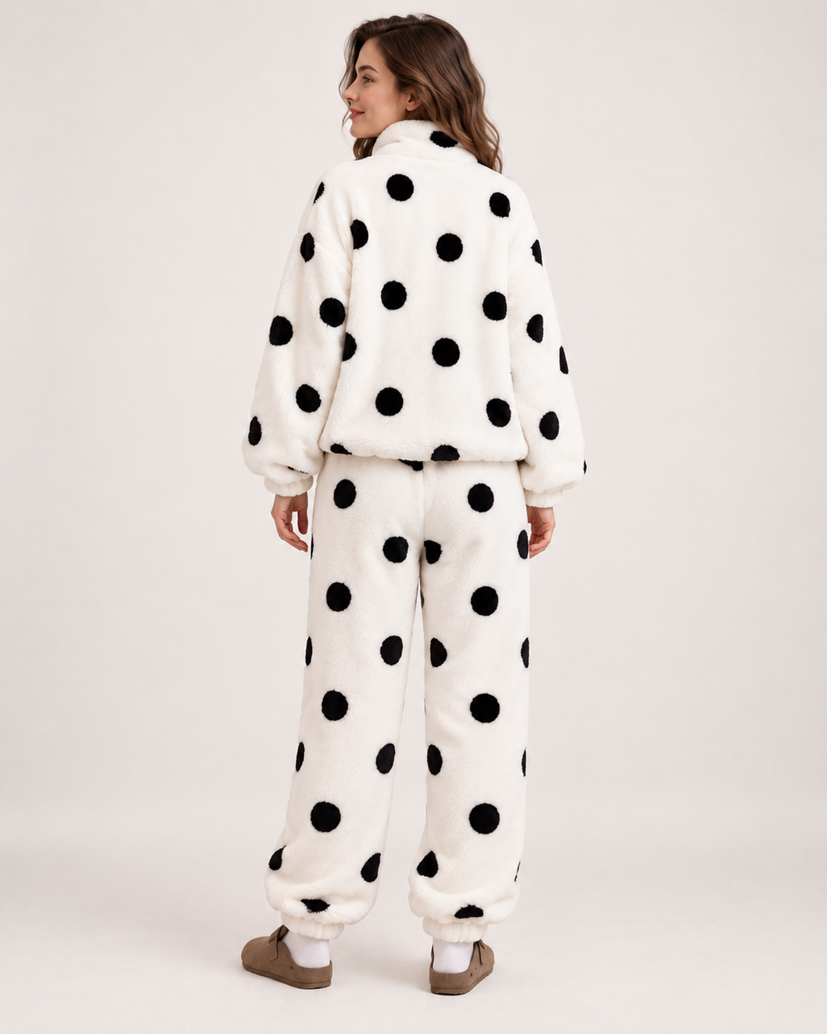 Women's white polka-dot fleece pyjama set, rear studio view