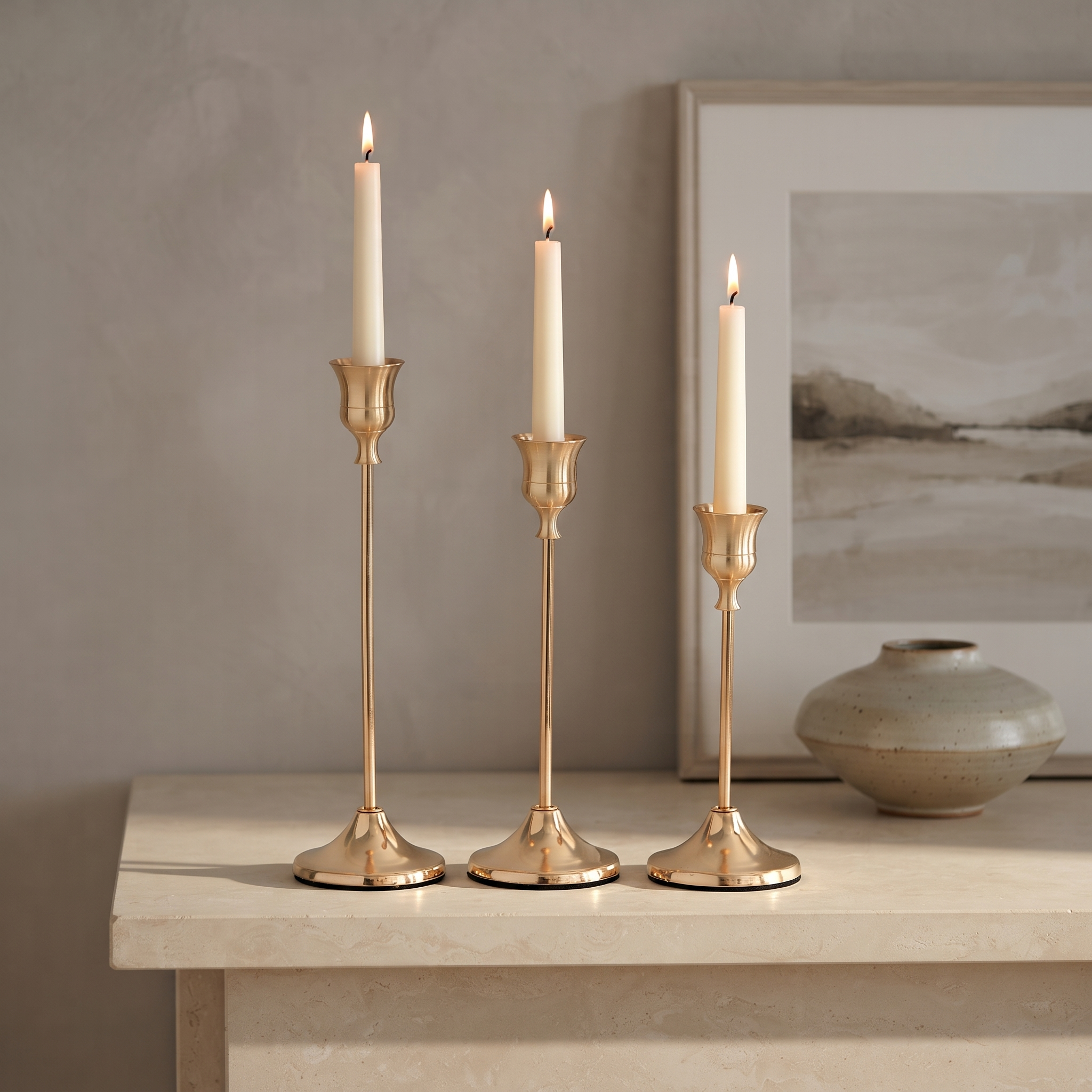 French Gold taper candle holder set on a mantel