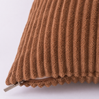 Close-up of the Coffee cushion cover ribbed texture and lower zip