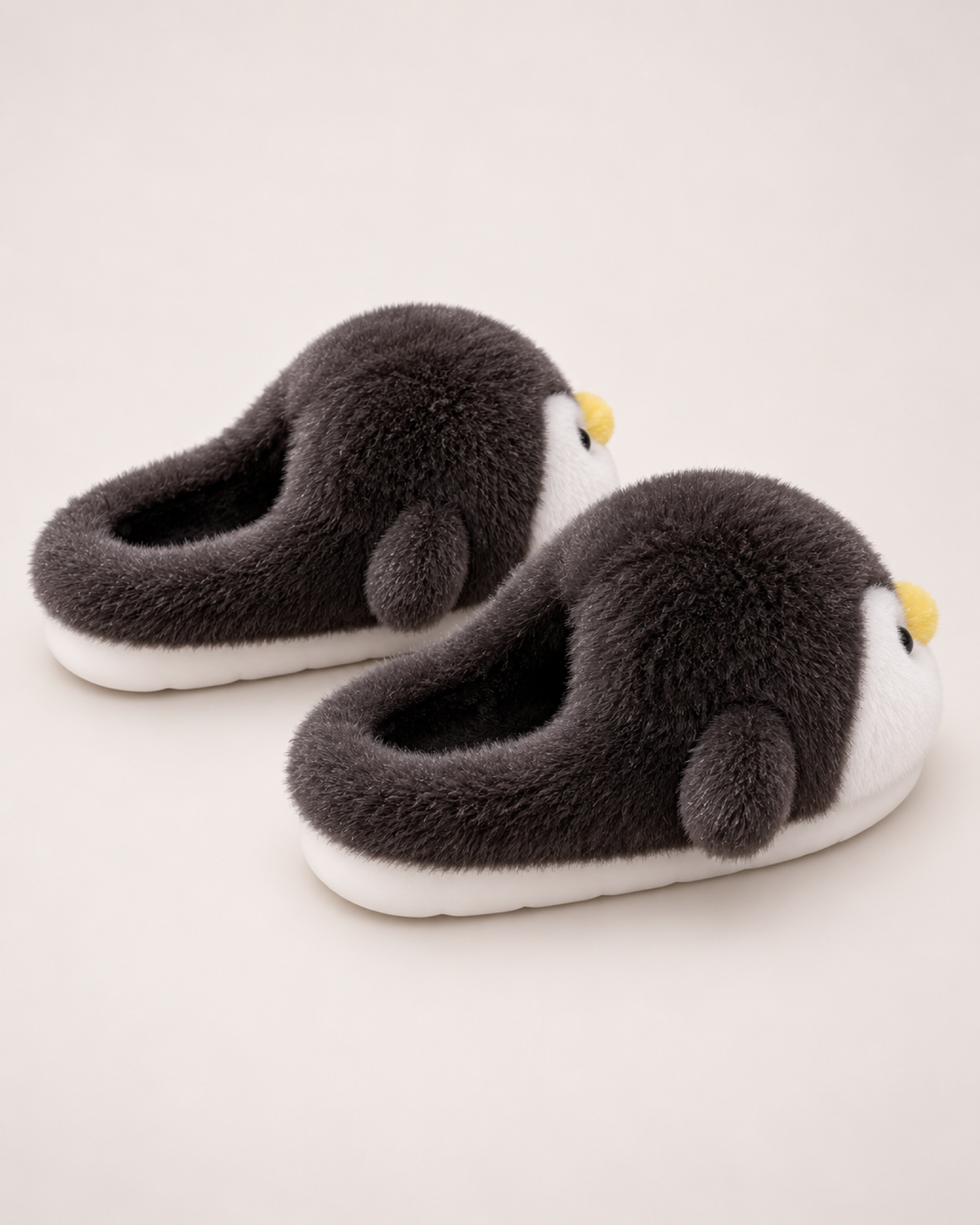 Women's Penguin Slippers in Black, rear heel view