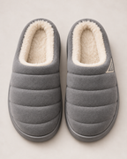 Men's grey quilted plush slippers, near-top studio view