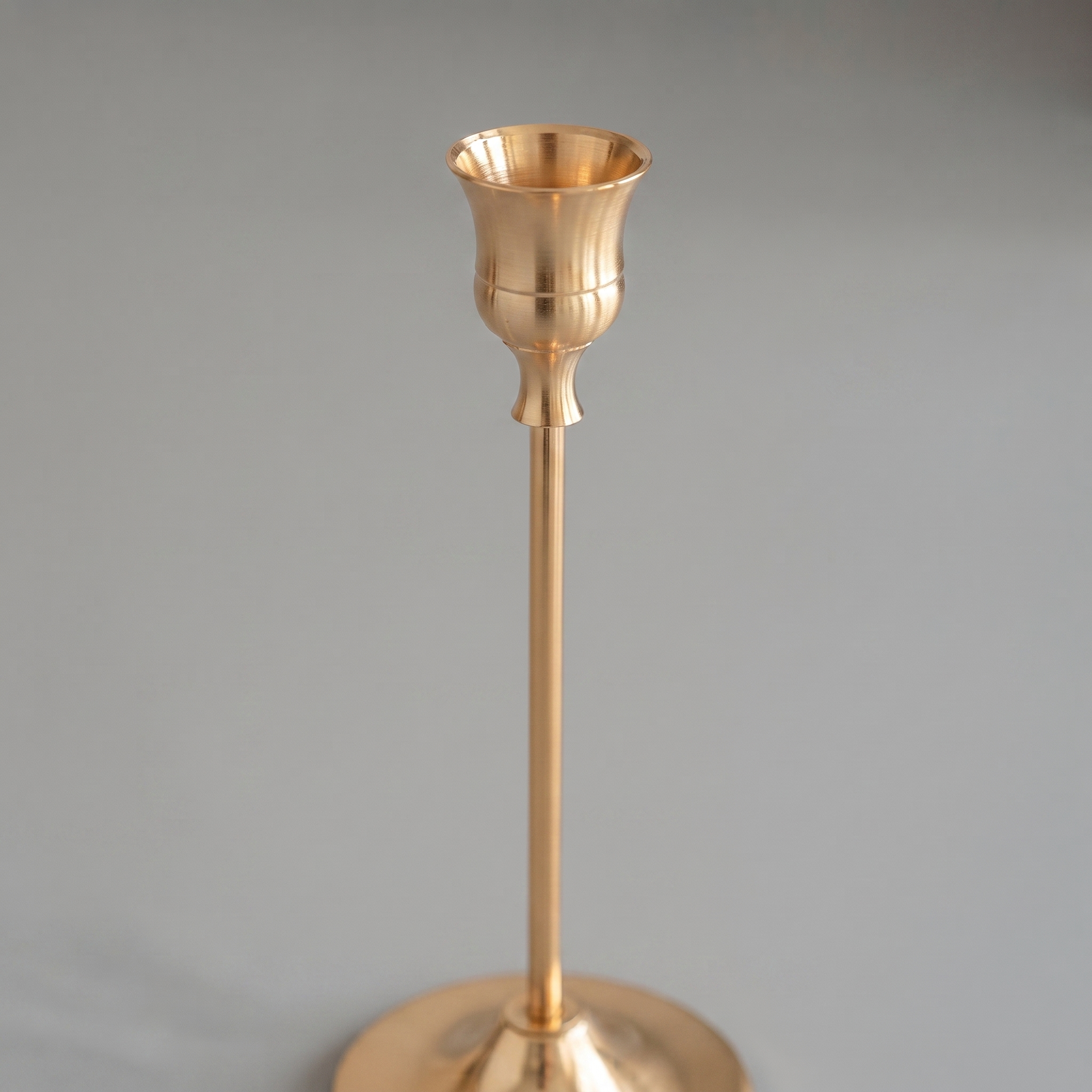 Close-up of the French Gold candle cups, stems and finish