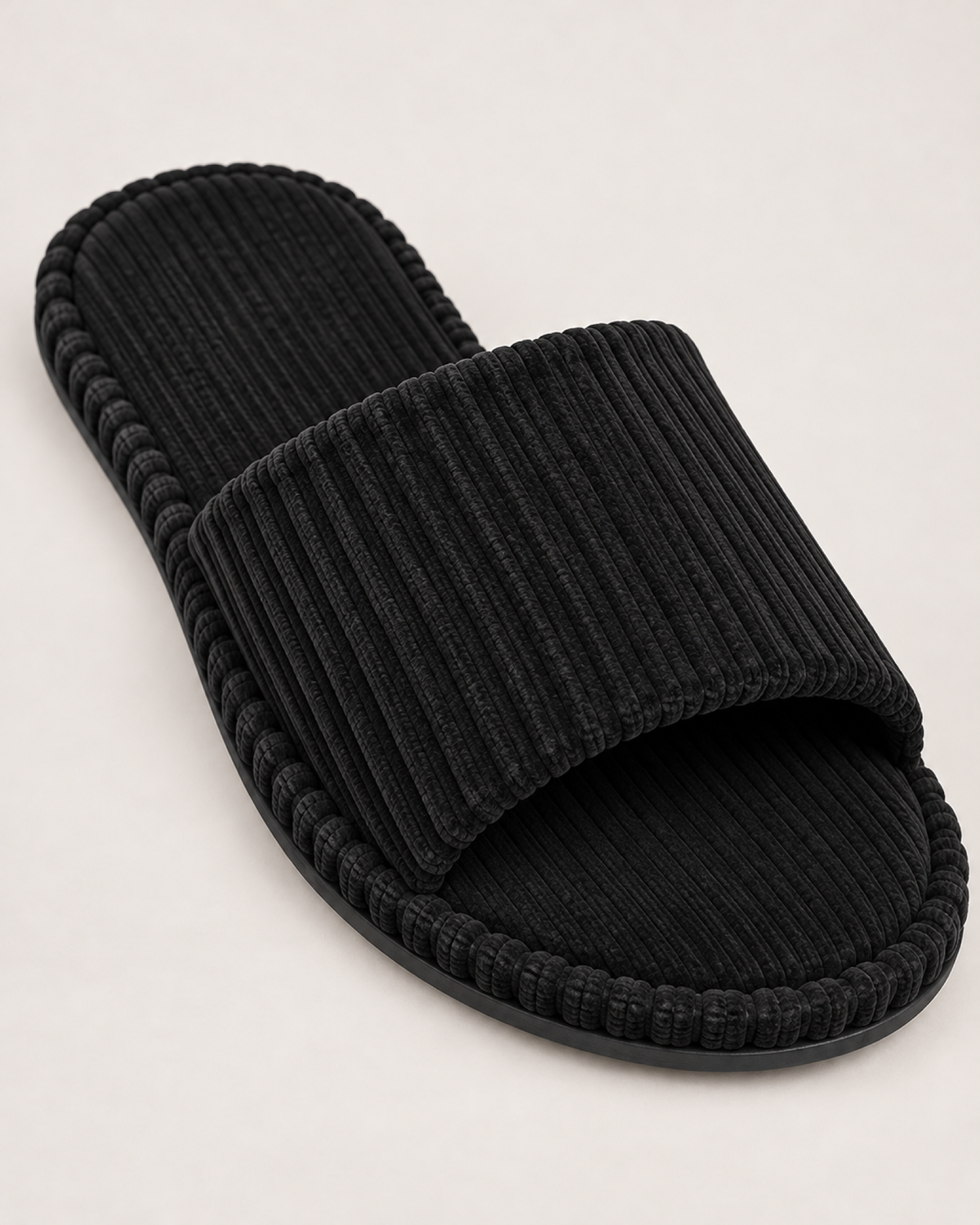 Men's black corduroy open-toe slippers, ribbed texture and sole detail