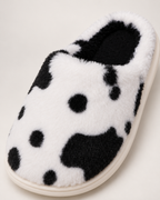 Women's Spotted Cow Slippers in Black, close-up detail