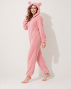 Women's pink bear-ear fleece onesie, walking studio view
