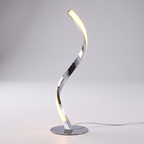 Close view of the reflective chrome spiral lamp and warm diffuser