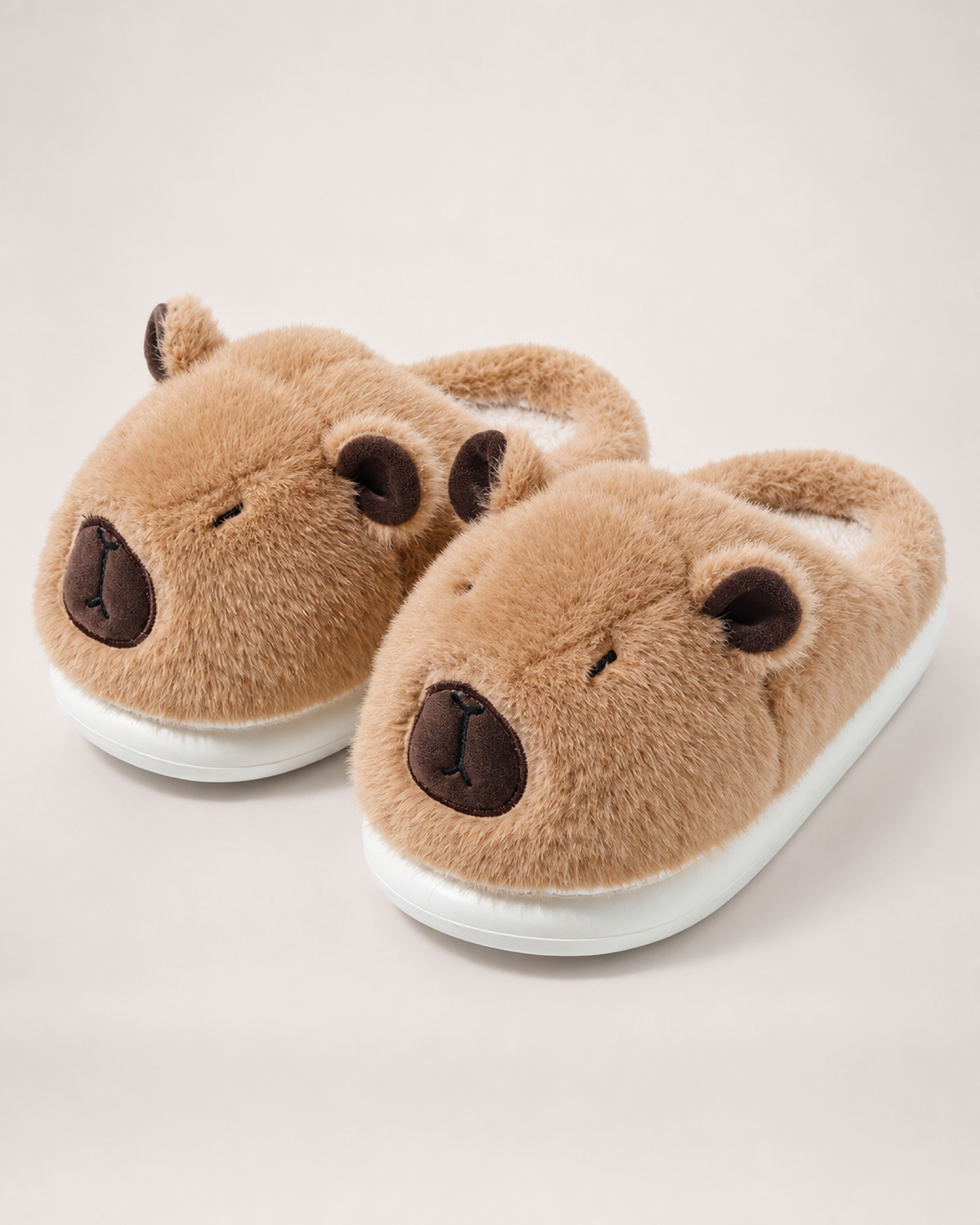 Plush Capybara Slippers in Brown, close up view