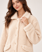 Women's Fleece Pyjama Set – Button-Front Loungewear, close detail of the fleece texture, rounded collar, buttons, patch pocket and cuff