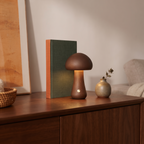 Walnut Willow mushroom lamp styled on a sideboard beside an A5 book