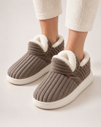 Striped House Slippers in Brown, worn indoors