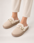 Faux Fur Buckle Mule Slippers in Beige, worn indoors