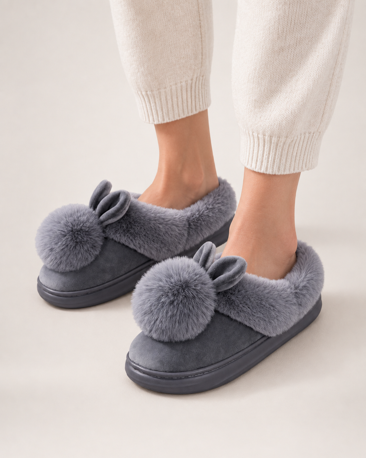 Women's Closed Back Slippers in Grey, worn indoors