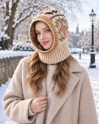 Women's beige floral crochet hooded scarf, snowy winter lifestyle view
