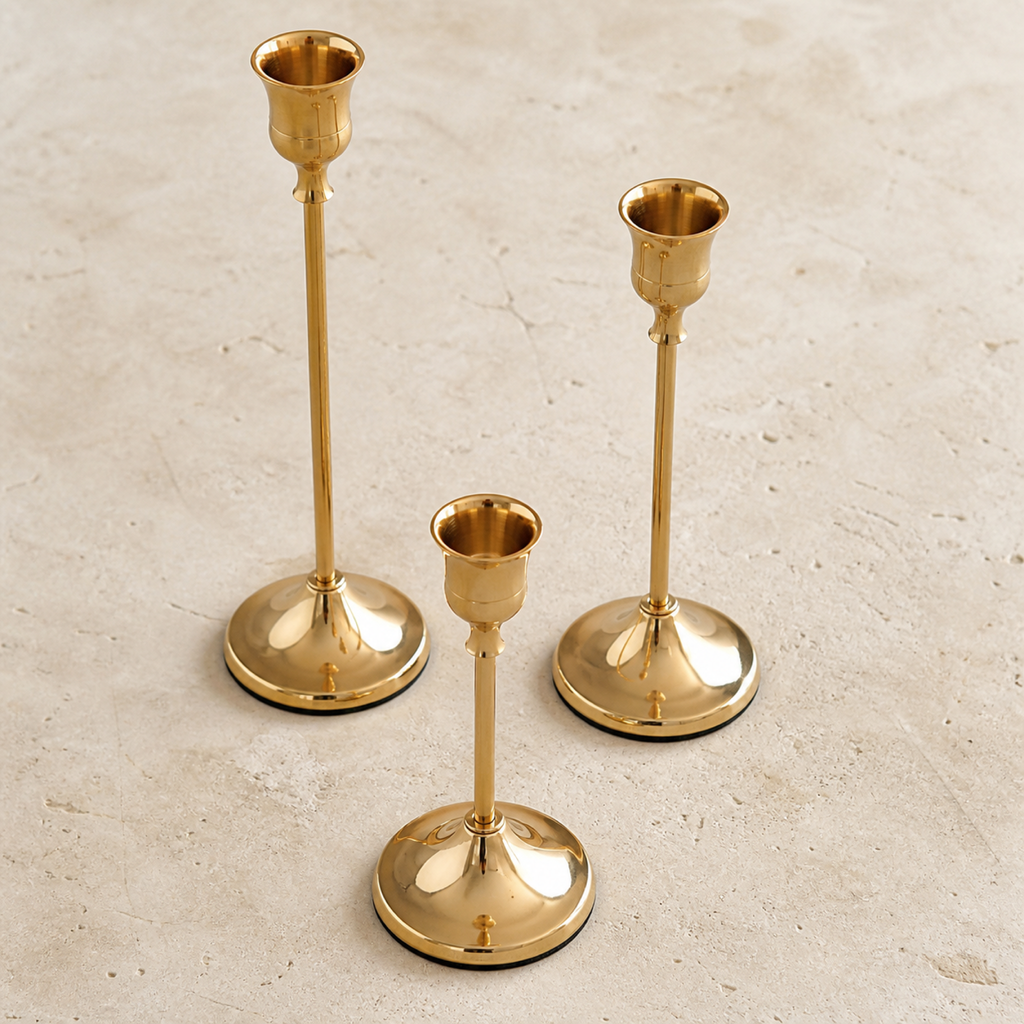 French Gold taper candle holder set showing the three coordinated bases
