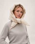 Women's Quilted Puffer Headscarf in Cream, styled waist-up view