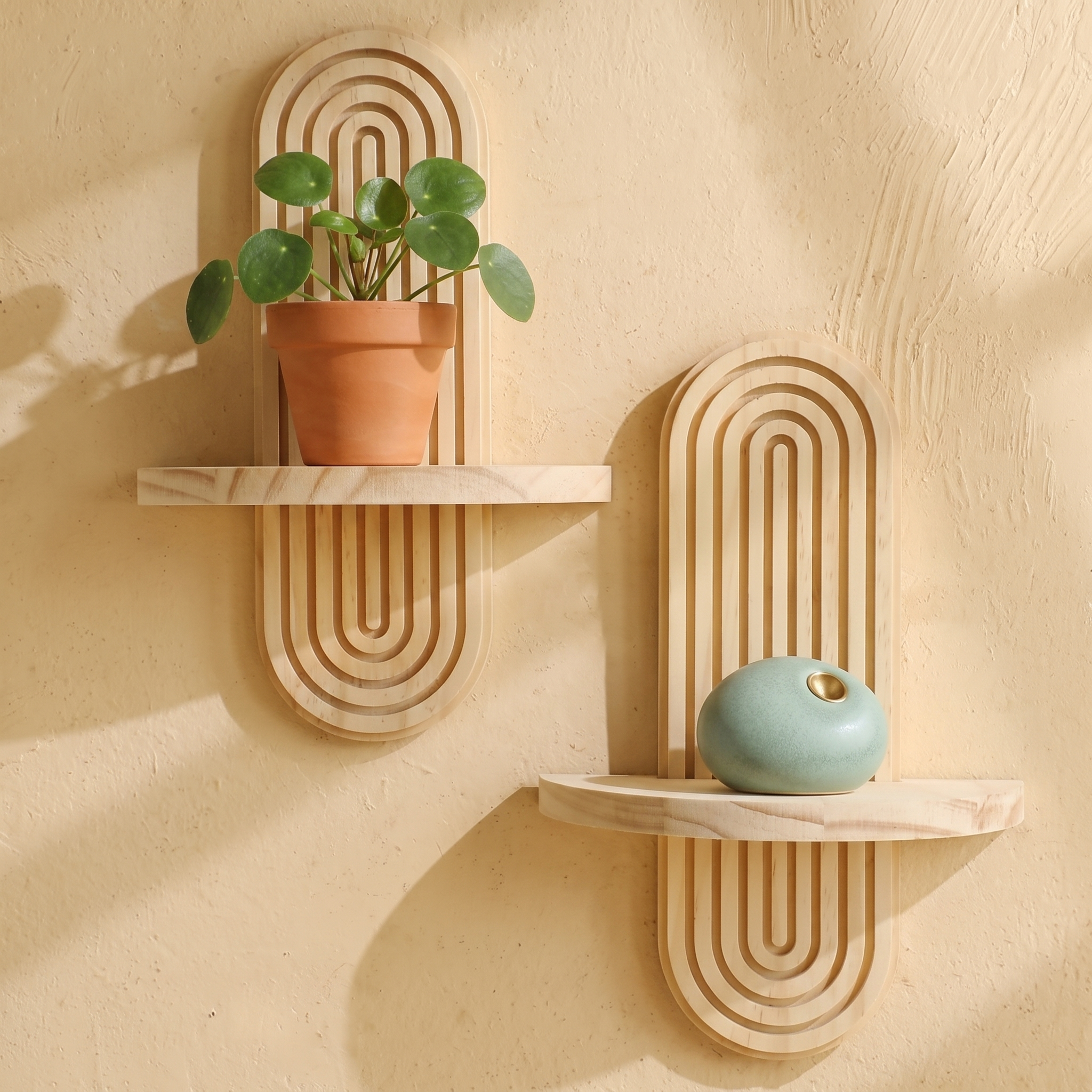 Solenne Arched Wall Planter in Halo Pair — Convey realistic compact scale with familiar small objects.