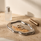 Mira Cloud Jewellery Tray in Silver Mirror — Communicate compact scale with familiar vanity objects.