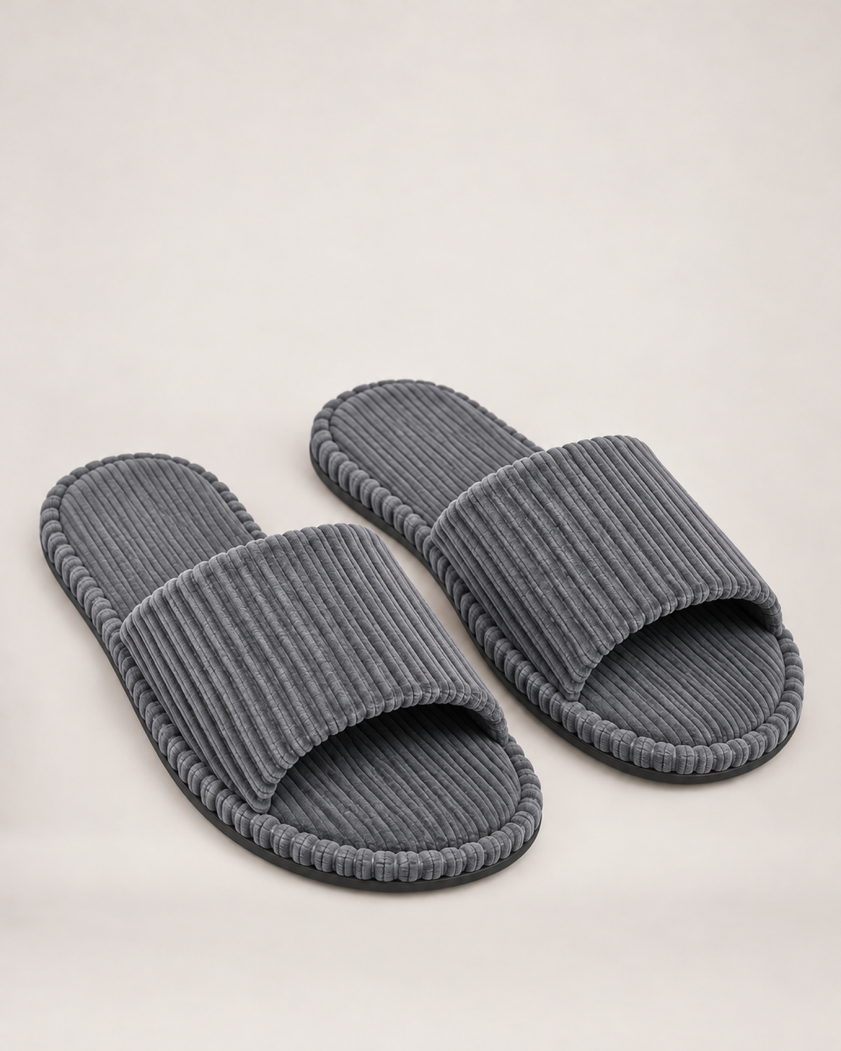 Men's grey corduroy open-toe slippers, front three-quarter studio view