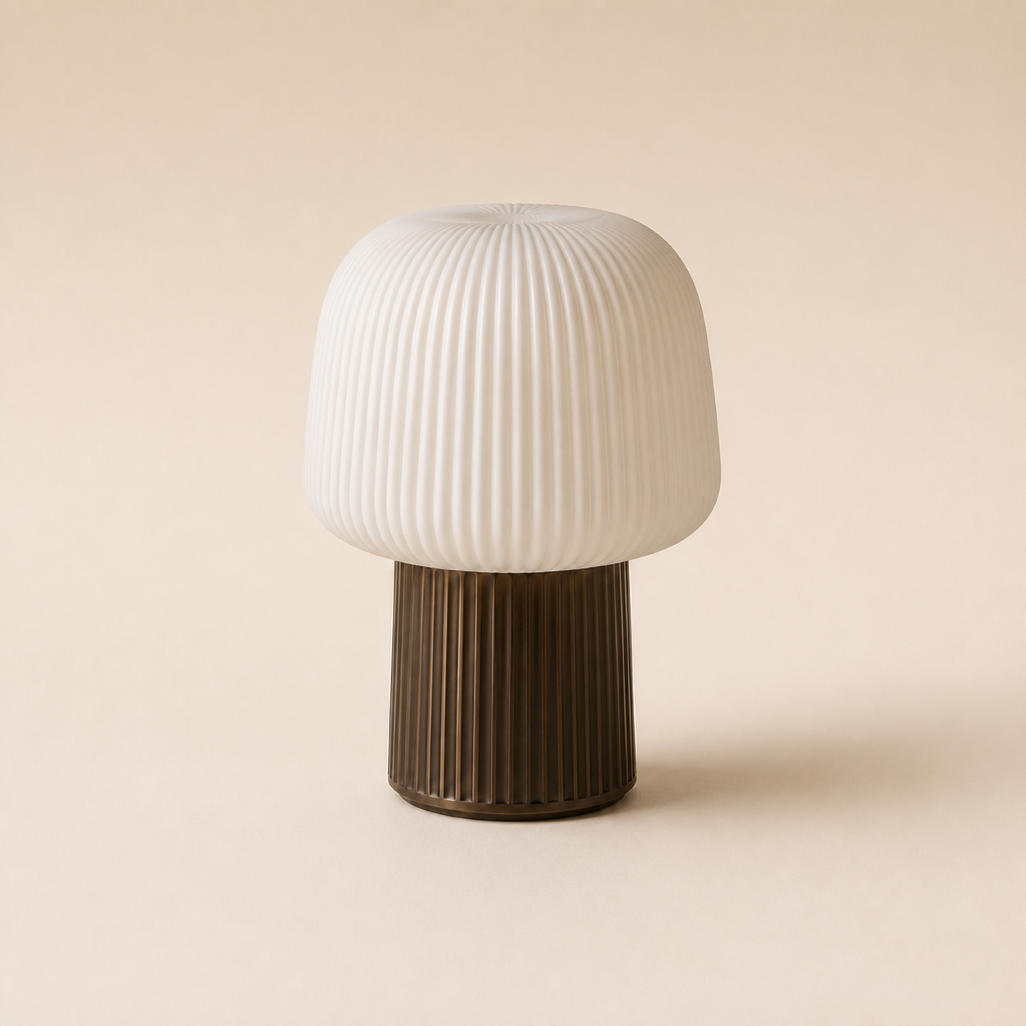 Ribbed ivory table lamp from a right three-quarter angle