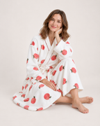 Women's Peach Print Dressing Gown – Long Wrap Style, seated studio
